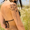 rose hand tattoo fine line mockup on the shoulder