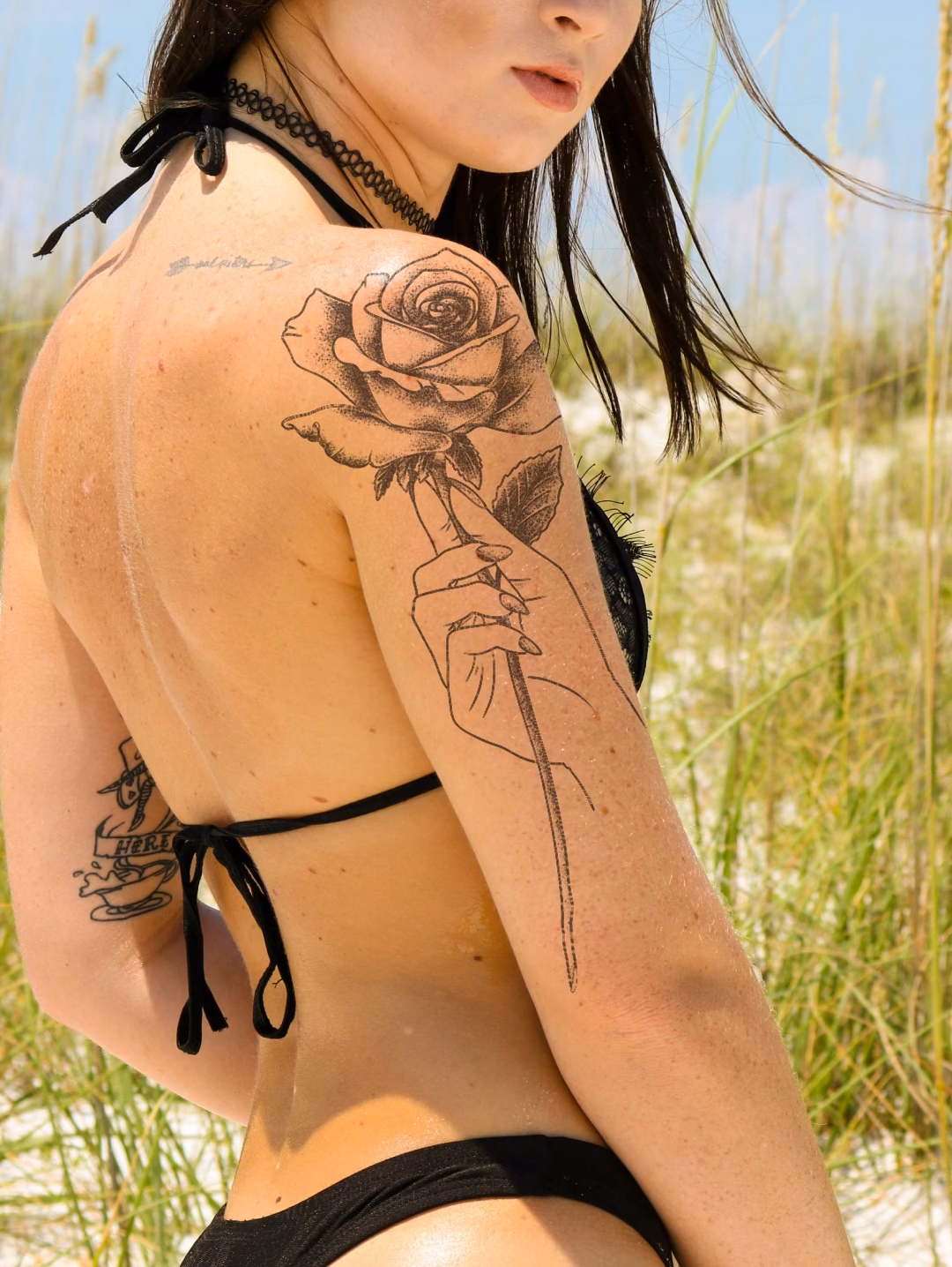 rose hand tattoo fine line mockup on the shoulder