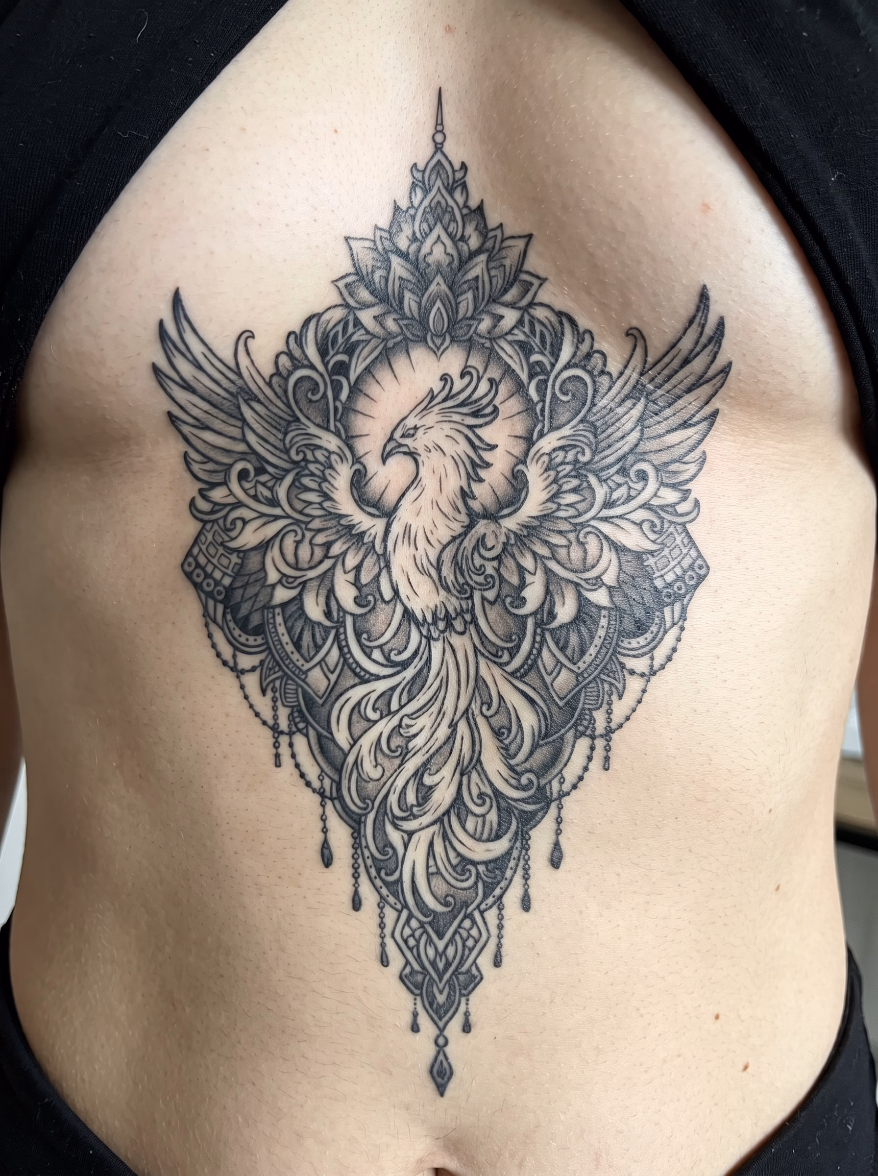 phoenix tattoo mandala tattoo sternum mandala tattoo mockup