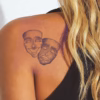 theater masks tattoo design mockup on the shoulder