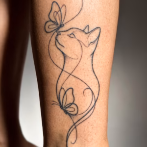 Printable cat and butterflies line art tattoo design with a graceful cat silhouette, delicate butterflies, flowing lines, and soft dotwork shading mockup
